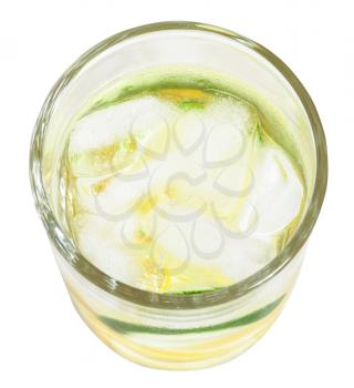 top view of glass tumbler with cold lemonade drink from lemon and lime isolated on white background