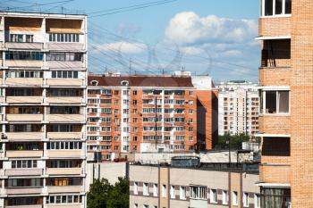 Residential buildings in city block in sunny summer day