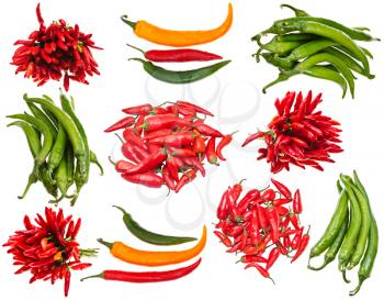 set of various raw hot peppers isolated on white background