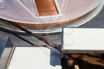 magnetic recording tape in reel close up in reel-to-reel recorder