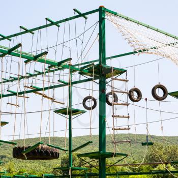 rope-ladders in outdoor obstacle course in sunny summer day