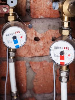 pair new mechanical water meters on pipes