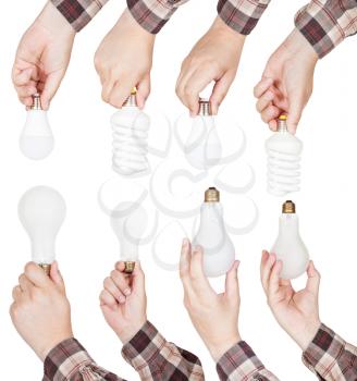 set of hands hold various lamps isolated on white background
