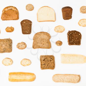 various sliced bread loaves on white background