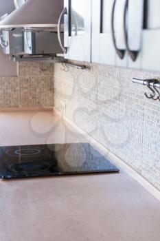 new kitchen worktop from artificial stone with built-in cooking stove