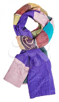 knotted scarf stitched from strips of clenched silk fabrics and painted batik isolated on white background