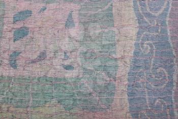 textile background - transparent stitched clenched silk cloth and painted batik on background