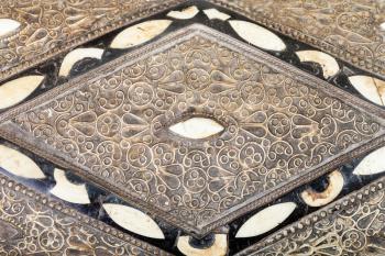 inlay and ornament on cover of traditional ancient arabic Casket close up