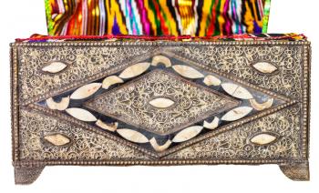 traditional ancient arabic Casket decorated by incrustation with textile upholstery isolated on white background