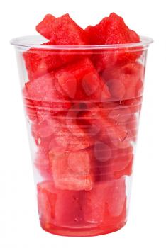 side view of plastic glass with pieces of ripe watermelon isolated on white background