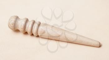 Leather crafting tool - round wooden Multi-Size Edge Slicker and Burnisher on natural leather