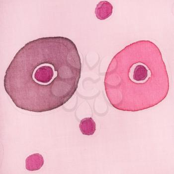 textile background - abstract circles drawn on colored silk batik