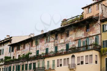 travel to Italy - facade of medieval house (Case Mazzanti) on Piazza delle Erbe (Market's square) in Verona city
