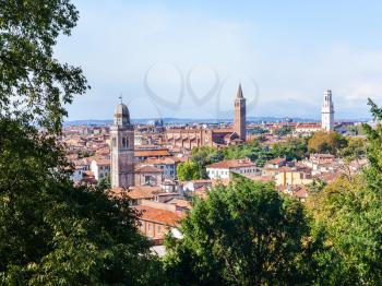 travel to Italy - view of Verona old town between green trees