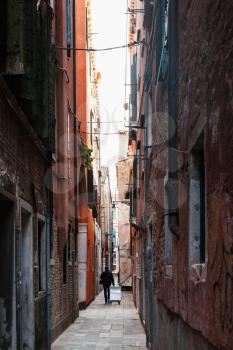 travel to Italy - narrow street in historic area of Venice city