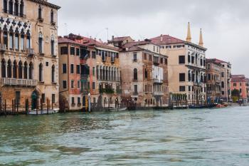 travel to Italy - wet palaces on Grand Canal in Venice in autumn rain