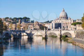 travel to Italy - Rome and Vatican city skyline with Basilica St. Peter's, Tiber river, Ponte Sant' Angelo (Bridge of Holy Angel) in autumn morning