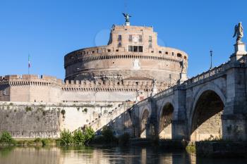 travel to Italy - Castel Sant'Angelo (Castle of Holy Angel, Mausoleum of Hadrian) and St Angel bridge in Rome city from Tiber river waterfront