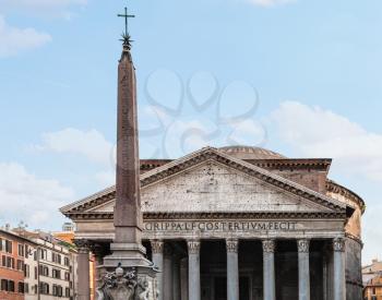 travel to Italy - front view of facade of Pantheon temple and egyptian obelisk on piazza della rotonda in Rome city