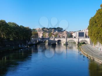 travel to Italy - Tiber river and Ponte Sant' Angelo (Bridge of Holy Angel) in Rome in autumn morning