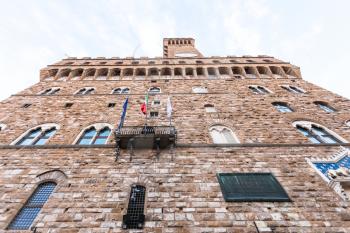 travel to Italy - bottom view of facade Palazzo Vecchio (Old Palace) in Florence city in morning