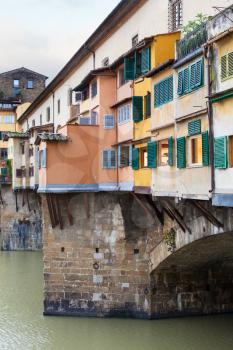 travel to Italy - houses and Vasari corridor on ponte vecchio in Florence city in autumn