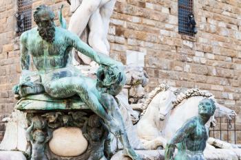 travel to Italy - figure of fountain of neptune close up in Florence city