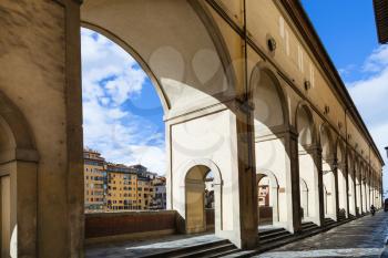 travel to Italy - vasari corridor along quay in Florence city in sunny autumn day