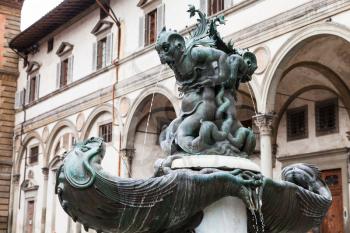 Fountain of sea monsters (fontane dei mostri marini) and Loggia dei Servi di Maria on Piazza della Santissima Annunziata. The fountain was built in 1627-1641 by Pietro Tacca