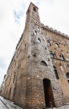 travel to Italy - wet tower of Bargello palace (Palazzo del Bargello, Palazzo del Popolo, Palace of the People) in Florence city after rain