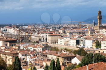 travel to Italy - skyline of Florence city with Ponte Vecchio and Palazzo Vecchio from Piazzale Michelangelo