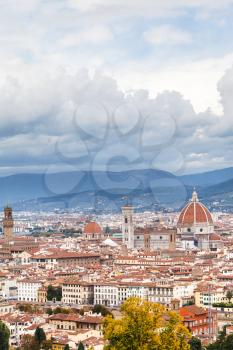 travel to Italy - view of cloudy sky over center of Florence city from San Miniato al Monte in autumn