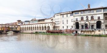 travel to Italy - panorama with ponte vecchio over Arno River, vasari corridor and Uffizi Gallery in Florence city