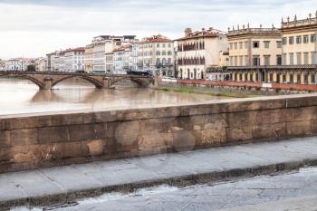 travel to Italy - bridges ponte santa trinita and ponte alla carraia and quay Lungarno Corsini in Florence city in autumn