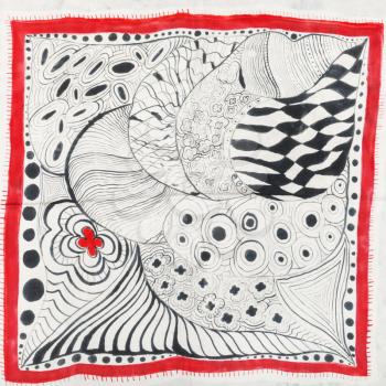 hand painted silk batik - abstract pattern with red flower and black curved lines on white cloth of head scarf