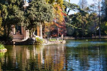 travel to Italy - pond with Temple of Aesculapius in Villa Borghese public gardens in Rome city in autumn