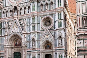 travel to Italy - ornamental walls of Duomo Cathedral Santa Maria del Fiore and Giotto's Campanile in Florence city