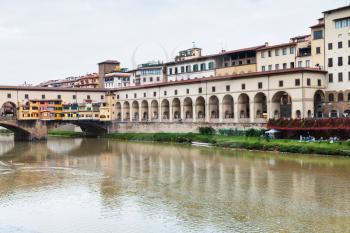 travel to Italy - view of vasari corridor and ponte vecchio in Florence city from Arno river