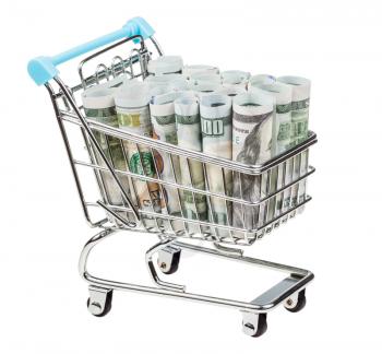 shopping-cart with rolls from dollar banknotes isolated on white background