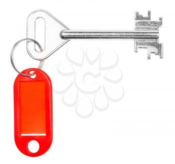 big door key with red blank key chain isolated on white background