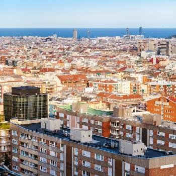above view of residential buildings in Barcelona city in spring evening twilight