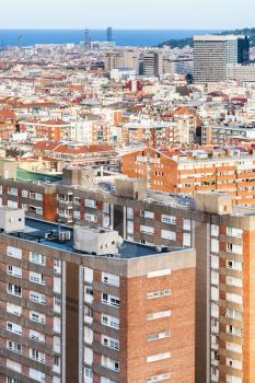 above view of apartment buildings in Barcelona city in spring evening twilight
