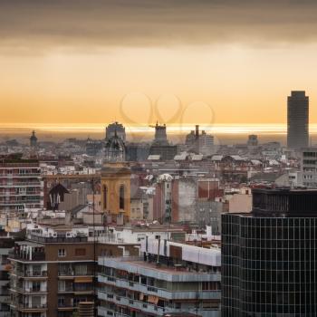 yellow sunrise over Barcelona city in spring