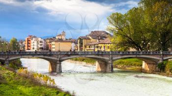 travel to Italy - stream and Ponte Verdi bridge in Parma city autumn day