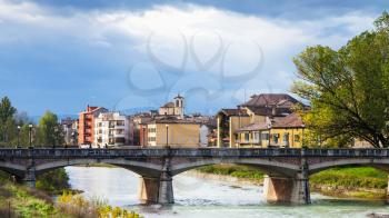 travel to Italy - Parma river and Ponte Verdi bridge in Parma city autumn day