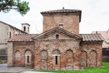 RAVENNA, ITALY - NOVEMBER 4, 2012: Mausoleum of Galla Placidia in Ravenna city. It was built between 425 and 433, this small mausoleum adopts a cruciform plan.