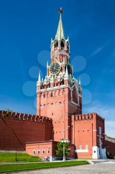 travel to Russia - Spasskaya Tower of Kremlin on Red Square in Moscow city in sunny spring day