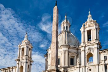 Travel to Italy - Egyptian obelisk and Church Sant Agnese on piazza Navonain Rome city