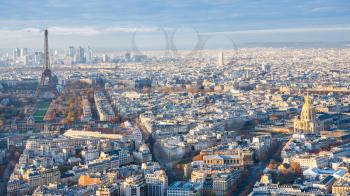 travel to France - panorama of Paris with Eiffel Tower and les invalides palace at winter sunset from Tour Maine - Montparnasse (Montparnasse Tower)