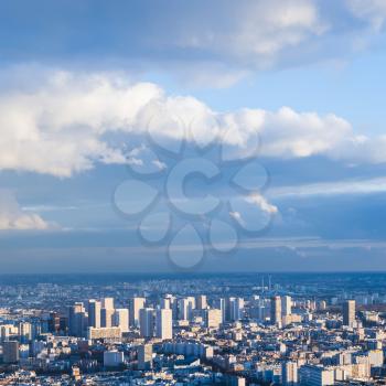travel to France - blue sky with clouds over modern Paris city in winter twilight from Tour Maine - Montparnasse (Montparnasse Tower)